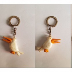 porte-clés Samos 99, oiseau grand bec ouvert, blanc (pc)