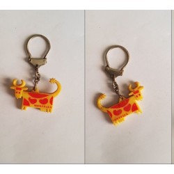 porte-clés vache jaune...